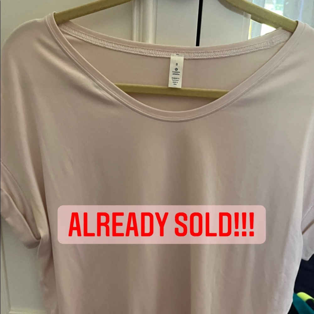Size 8 lululemon light pink cuffed sleeve t shirt